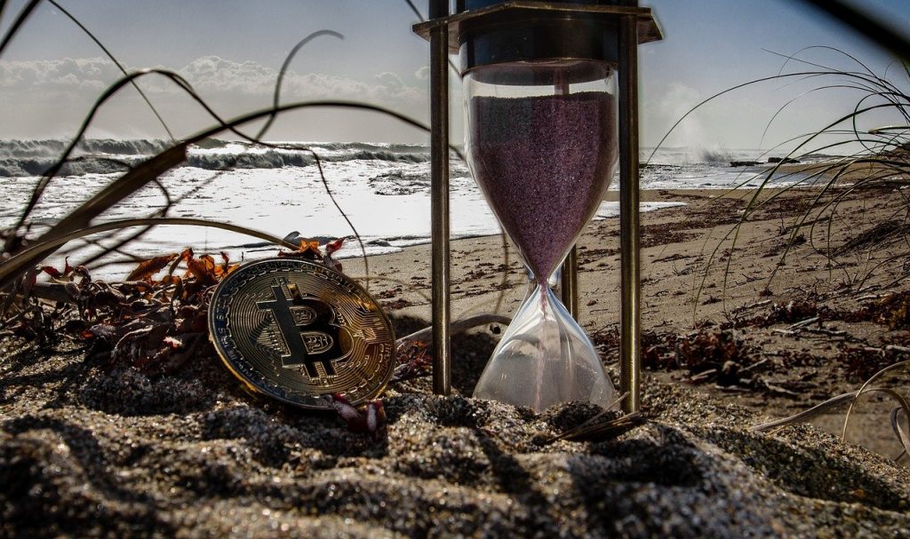 time bitcoin beach sandclock